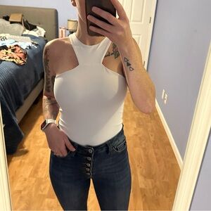 NWT. Size small double lined bodysuit